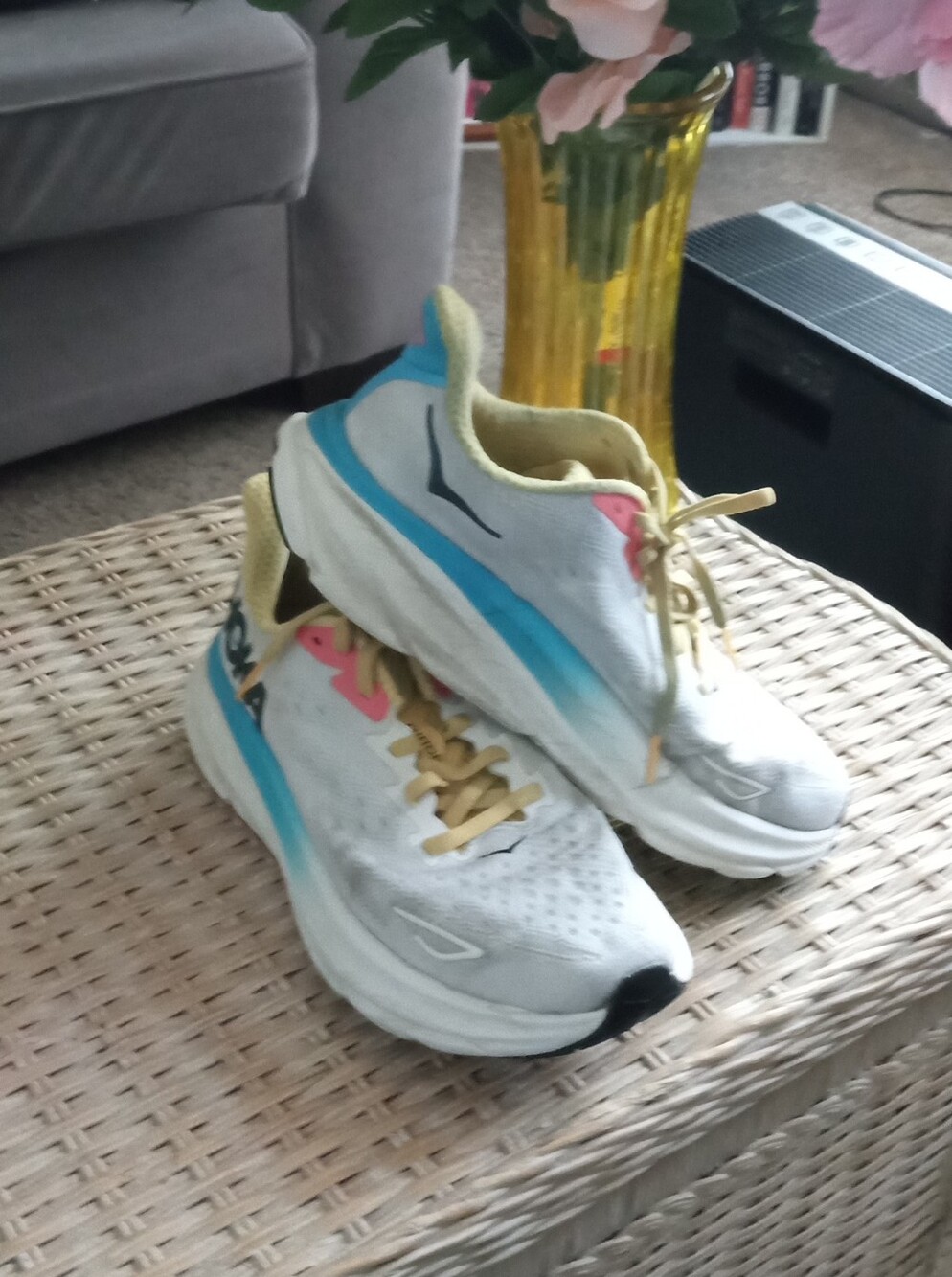 Hoka One One White Athletic Shoes with Blue and Pink Accents